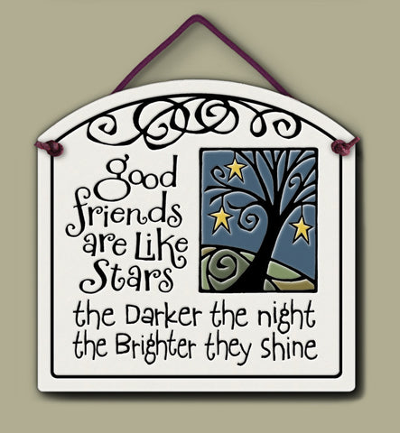 Ceramic wall tile with a night sky and tree illustration and the quote ‘Good friends are like stars—the darker the night, the brighter they shine.’