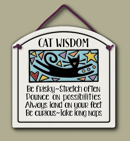 Ceramic wall tile with colorful cat illustration and the quote ‘Cat Wisdom: Be frisky, stretch often, pounce on possibilities, always land on your feet, be curious, take long naps.’