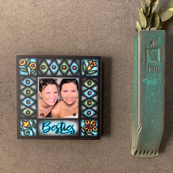 Besties best friend picture frame hanging on wall with Michael Macone artwork, small square wood frame with colorful floral design, handmade in Shell Lake Wisconsin