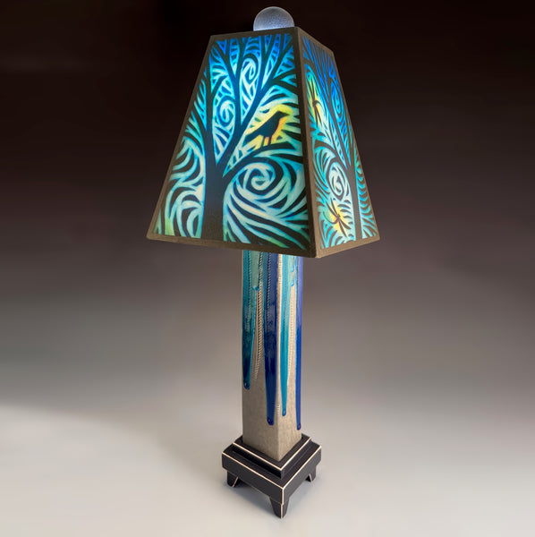 Bird and Dragonfly handmade ceramic table lamp with gray glass finish base, illuminated teal and blue wildlife shade by Michael Macone, made in Shell Lake Wisconsin