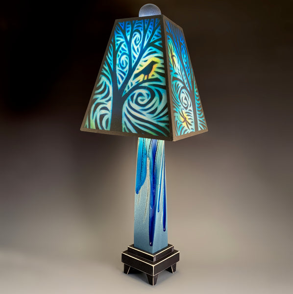 Bird and Dragonfly handmade ceramic table lamp with twisted blue extruded clay base, glowing forest and nature art shade by Michael Macone, made in Shell Lake Wisconsin