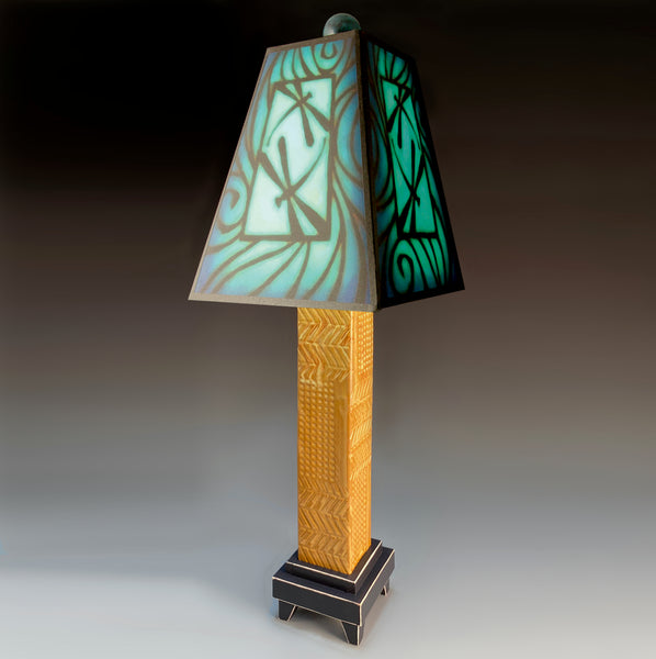 Blue Dragonfly handmade ceramic table lamp with brown stoneware base, illuminated bold dragonfly shade by Michael Macone, made in Shell Lake Wisconsin