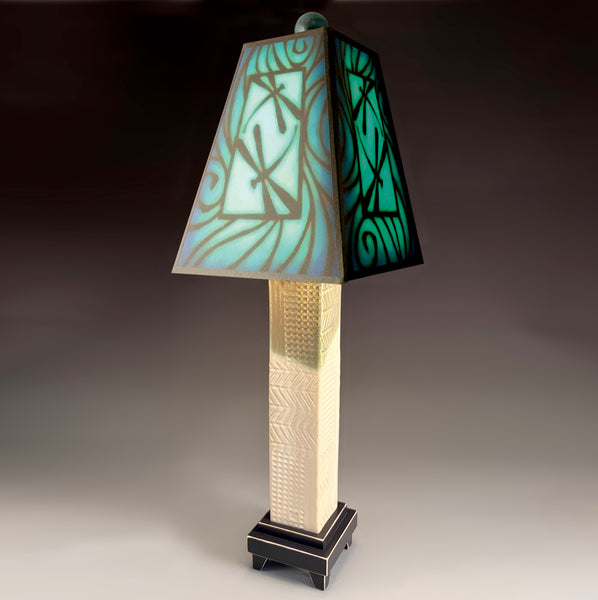 Blue Dragonfly handmade ceramic table lamp with white stoneware base, glowing teal and blue dragonfly art shade by Michael Macone, made in Shell Lake Wisconsin