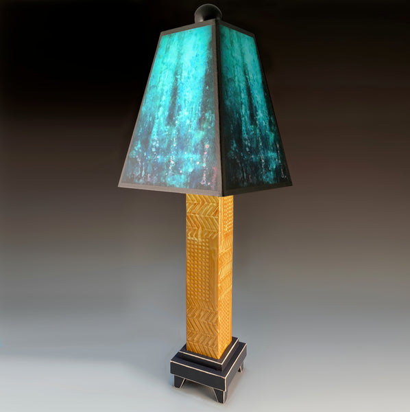Blue Rain handmade ceramic table lamp with brown stoneware base, glowing layered blue shade by Macone Clay, made in Shell Lake Wisconsin
