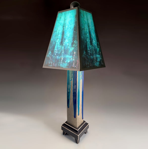 Blue Rain handmade ceramic table lamp with gray glass finish base, luminous layered blue shade by Macone Clay, made in Shell Lake Wisconsin