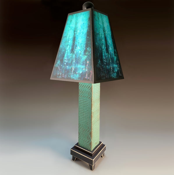 Blue Rain handmade ceramic table lamp with green stoneware base, rich blue layered glowing shade by Macone Clay, made in Shell Lake Wisconsin
