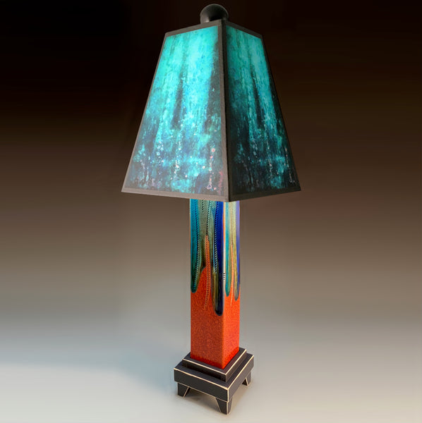 Blue Rain handmade ceramic table lamp with straight red extruded clay base, rich layered blue glowing shade by Macone Clay, made in Shell Lake Wisconsin
