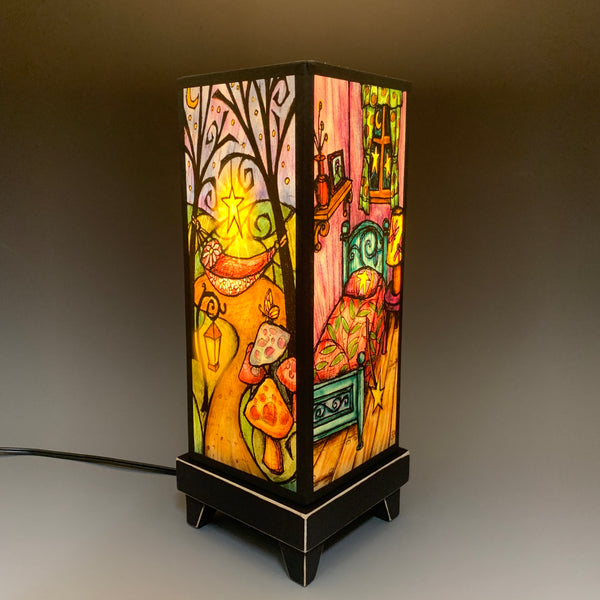 Fairy House mood lamp lit with room lights off, showing warm ambient glow