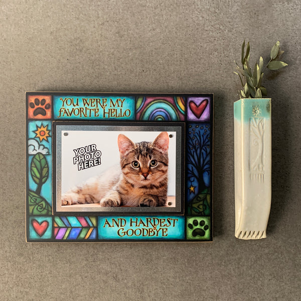 Pet memorial picture frame wall display featuring the quote You were my favorite hello and hardest goodbye with colorful artwork around a 4x6 photo.