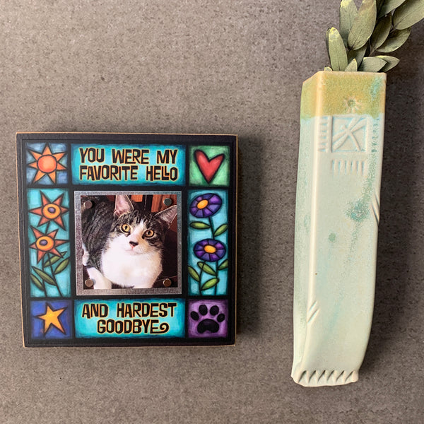 Pet memorial picture frame on wall with favorite hello hardest goodbye quote and colorful artwork, meaningful sympathy gift for dog or cat owners