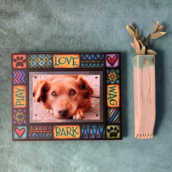 Dog picture frame wall display featuring quote Love Wag Bark Play with colorful Michael Macone artwork.