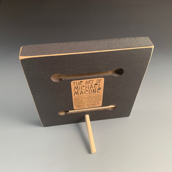 Back view of pet memorial picture frame showing tabletop peg and wall keyhole with Michael Macone artwork small square frame