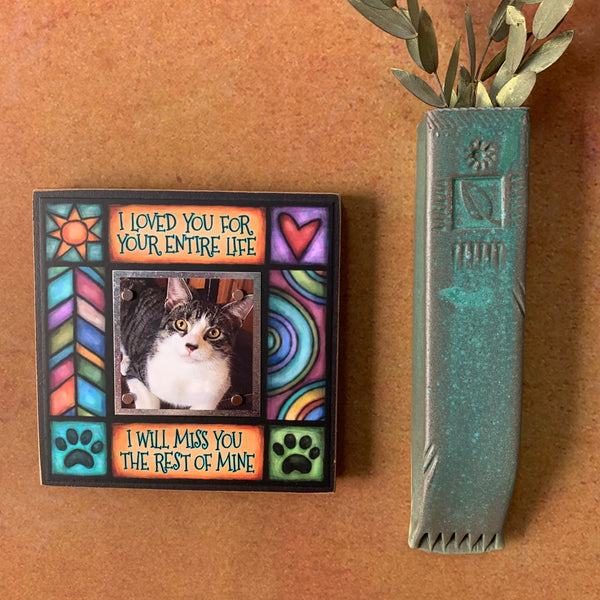 Wall display of pet memorial picture frame with I loved you for your entire life quote and Michael Macone artwork with magnetic photo display