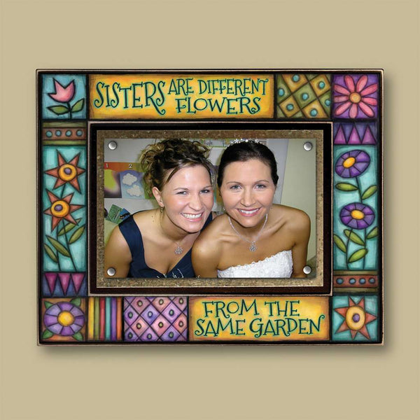Sisters picture frame sister gift with quote Sisters are different flowers from the same garden colorful Michael Macone artwork holding a 4x6 photo