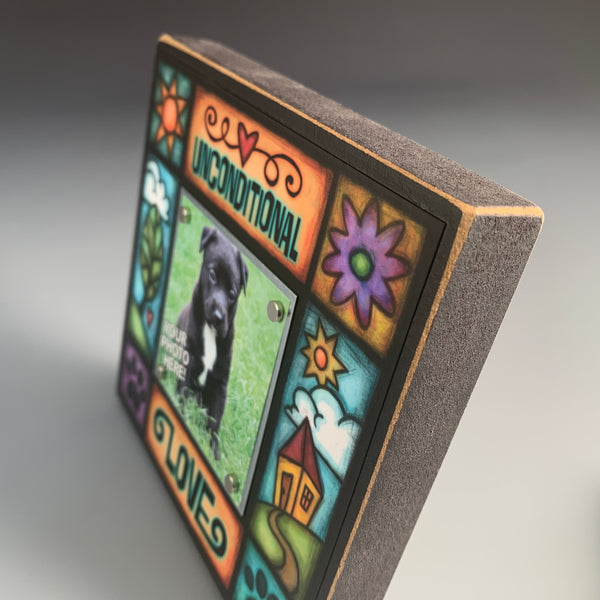 Close up of Unconditional Love dog lover picture frame with vibrant artwork and small photo display, meaningful pet gift for dog or cat owners