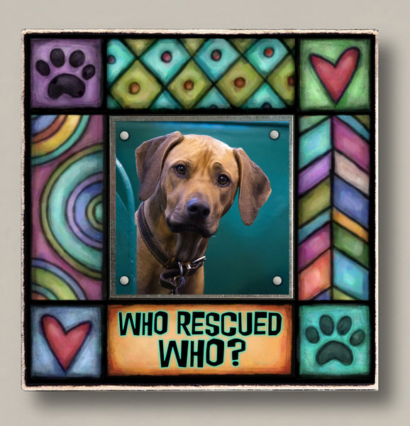 Who rescued who pet picture frame with colorful Michael Macone artwork featuring paw prints and hearts holding small square pet photo with magnetic display